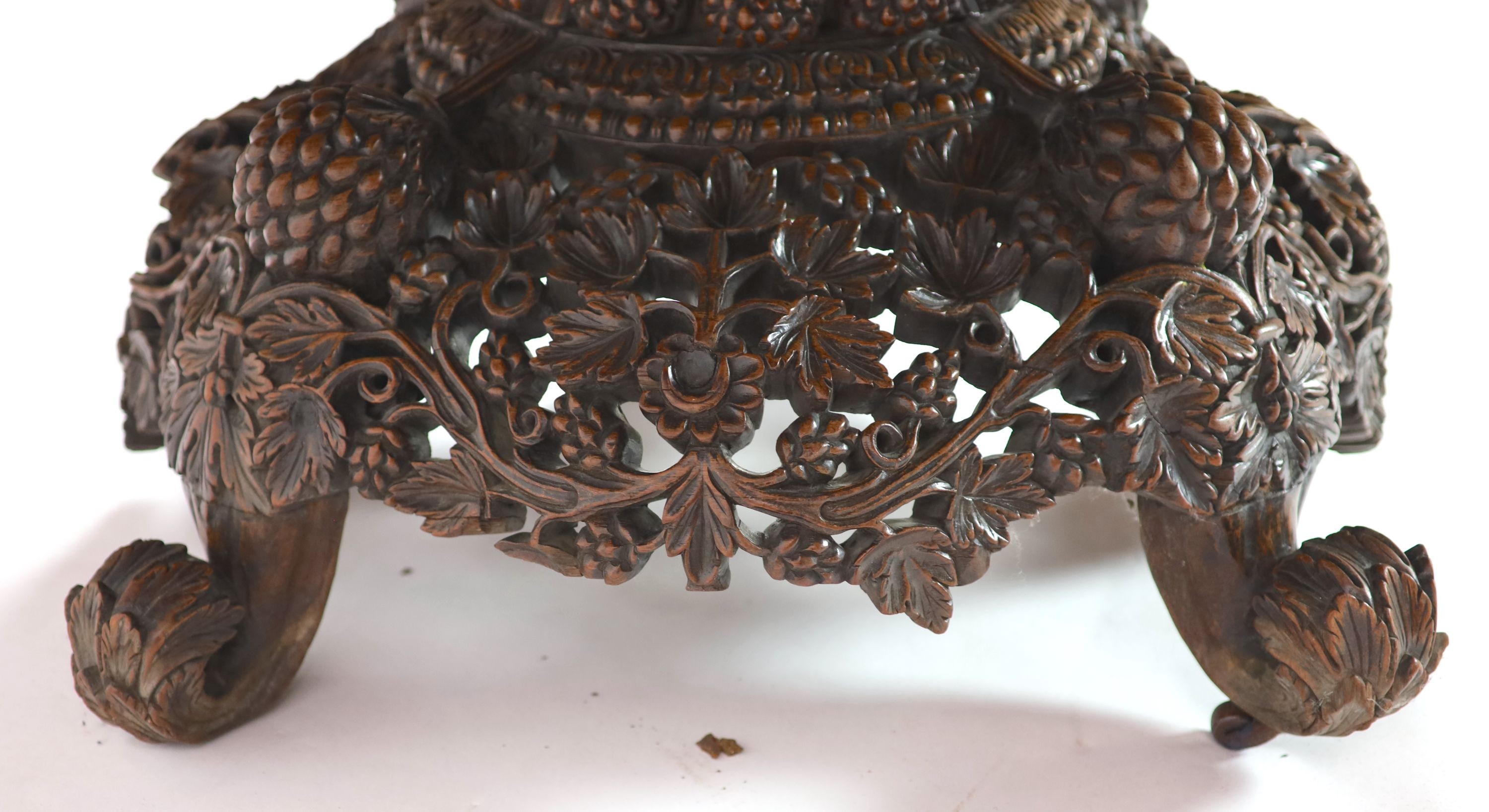 A 19th-century Ceylonese rosewood centre table, D 163cm. H 70cm.